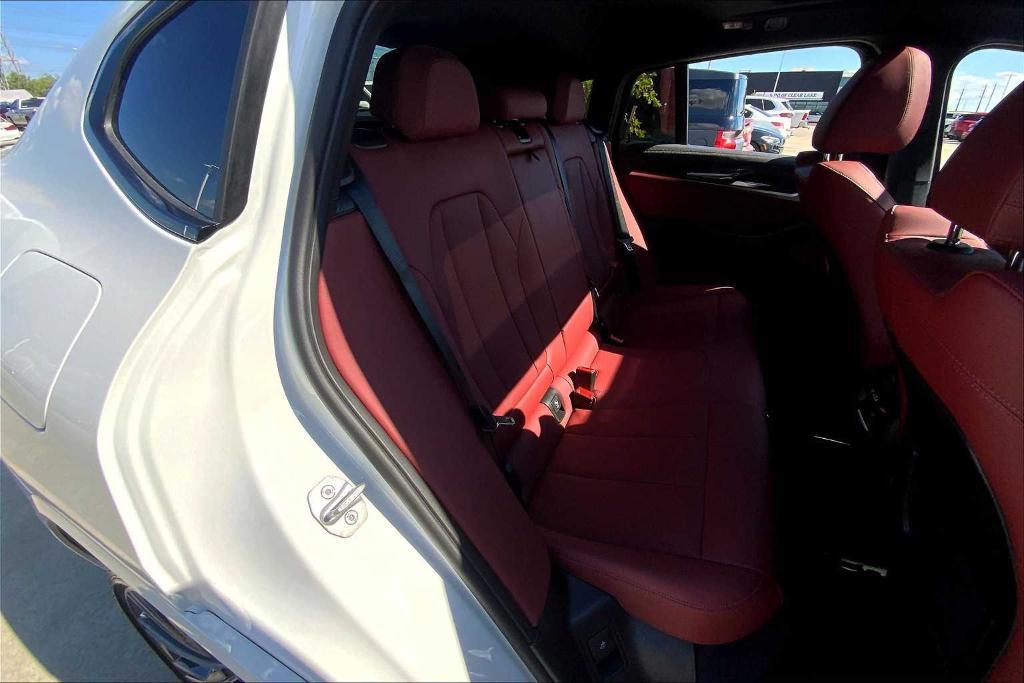 used 2025 BMW X4 car, priced at $67,988