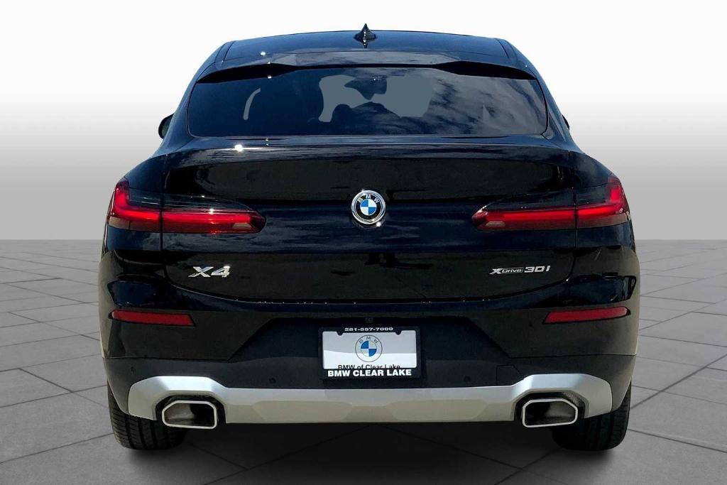 used 2025 BMW X4 car, priced at $57,988