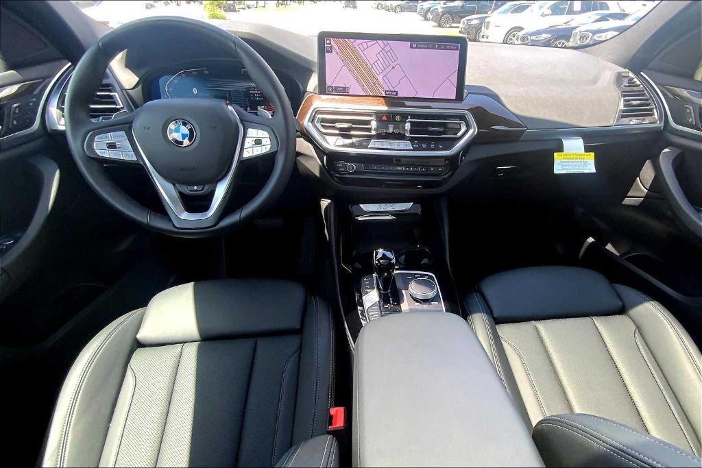 used 2025 BMW X4 car, priced at $53,988