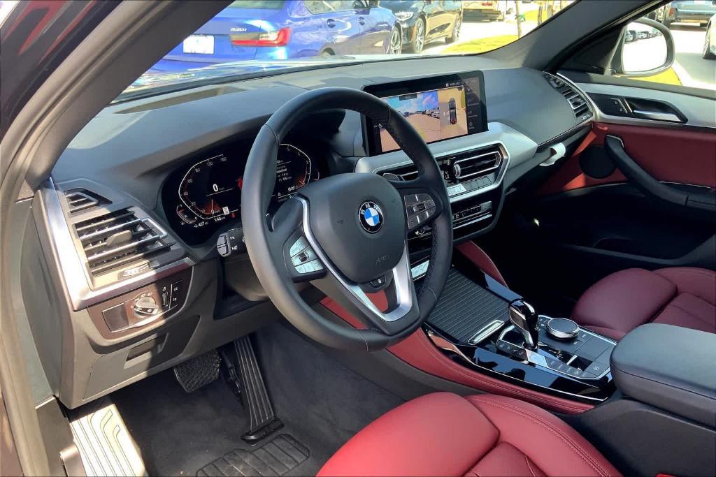 used 2024 BMW X4 car, priced at $48,818