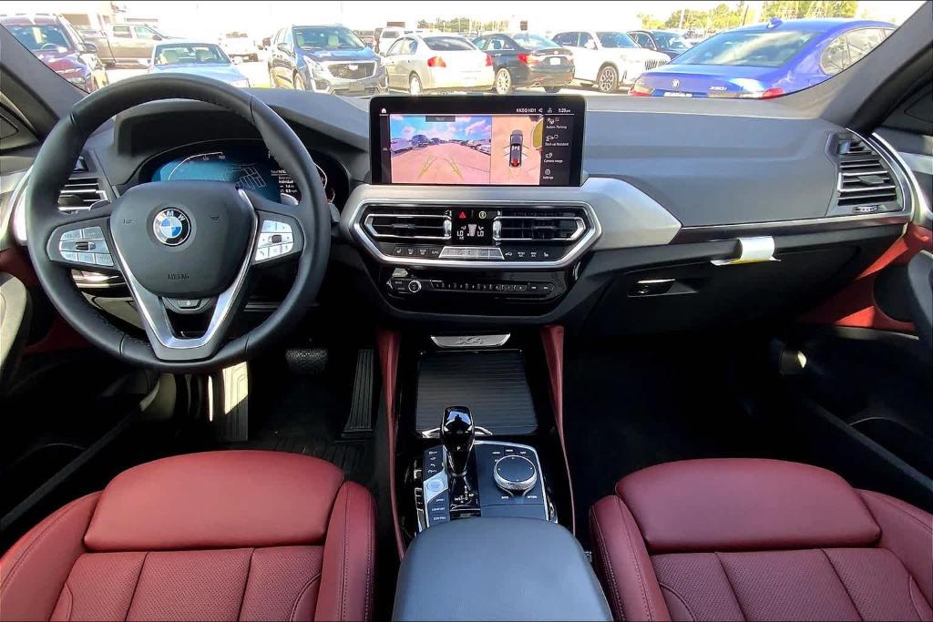 used 2024 BMW X4 car, priced at $48,818