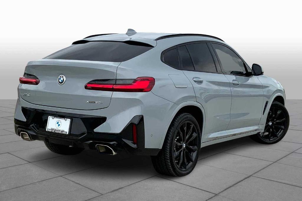 used 2022 BMW X4 car, priced at $39,999