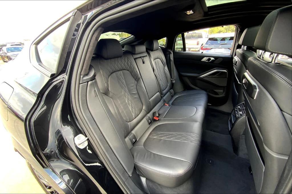 used 2025 BMW X6 car, priced at $77,999