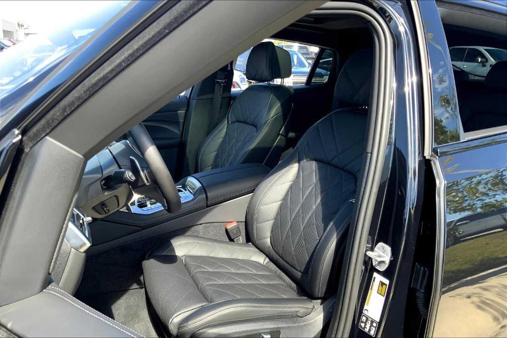used 2025 BMW X6 car, priced at $72,800