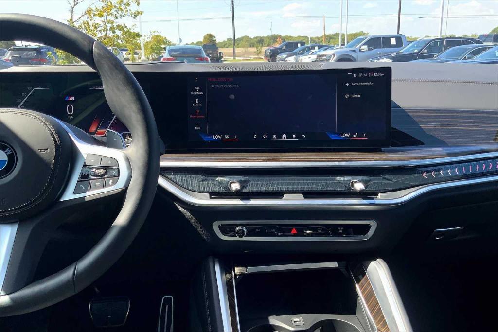 used 2025 BMW X6 car, priced at $72,800