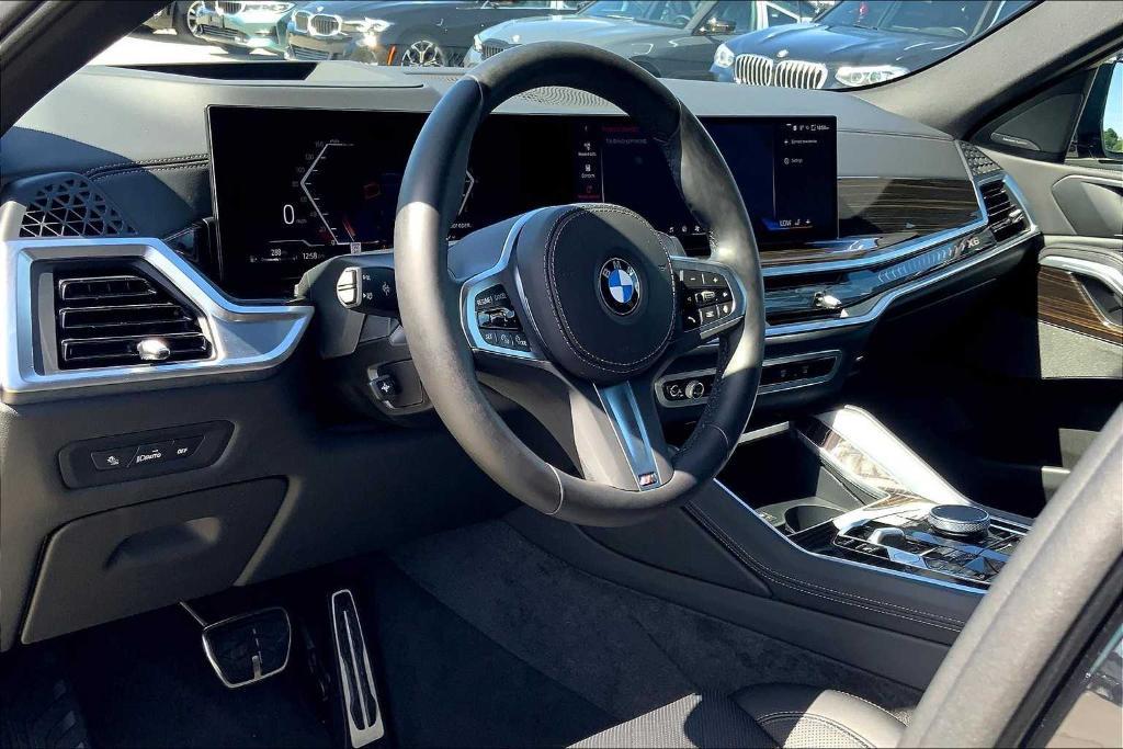 used 2025 BMW X6 car, priced at $72,800