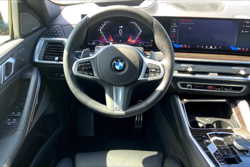 used 2025 BMW X6 car, priced at $72,800