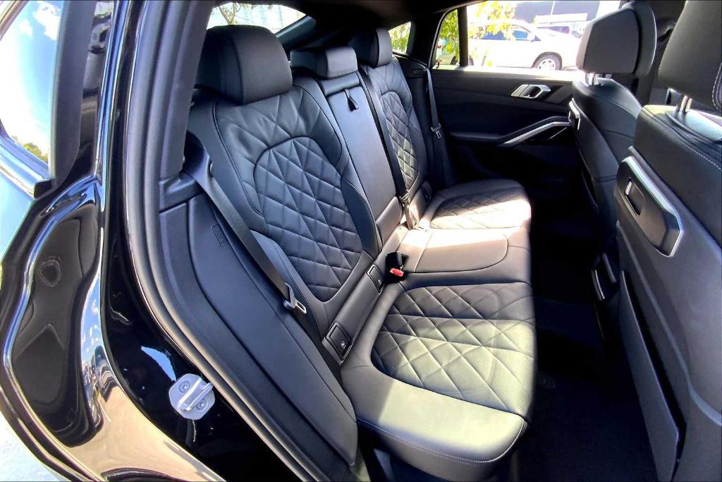 used 2025 BMW X6 car, priced at $72,800