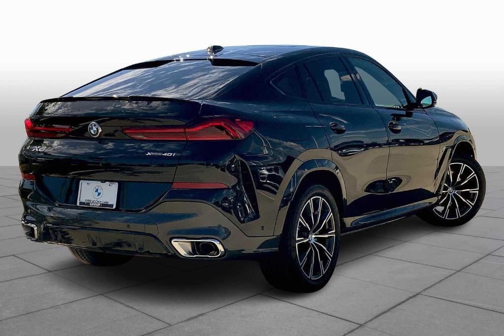 used 2025 BMW X6 car, priced at $72,800
