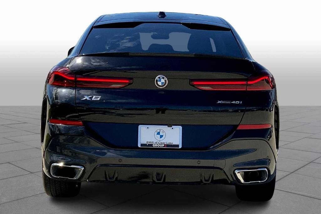 used 2025 BMW X6 car, priced at $72,800