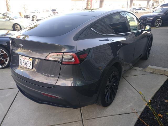 used 2023 Tesla Model Y car, priced at $35,516