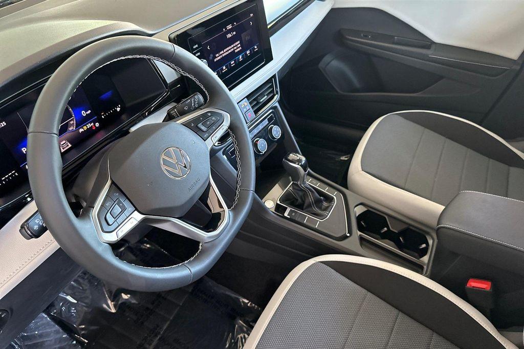 new 2025 Volkswagen Taos car, priced at $25,083