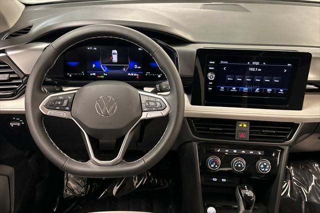 new 2025 Volkswagen Taos car, priced at $26,711