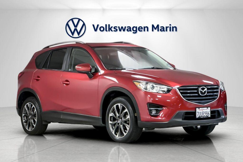 used 2016 Mazda CX-5 car, priced at $14,000