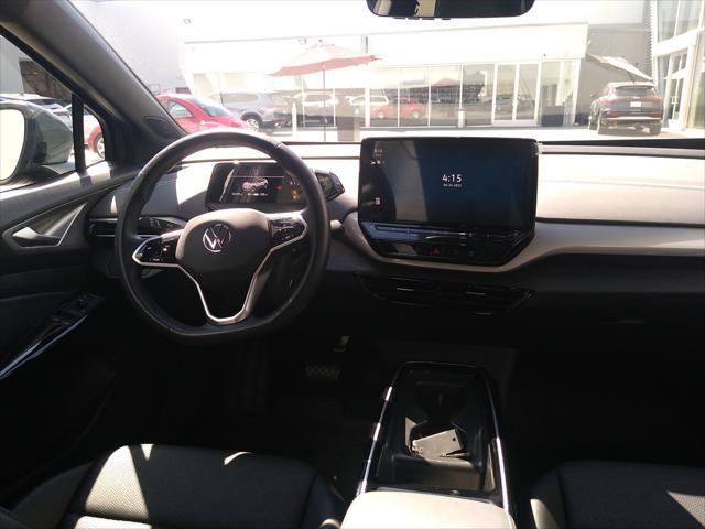 used 2023 Volkswagen ID.4 car, priced at $27,019