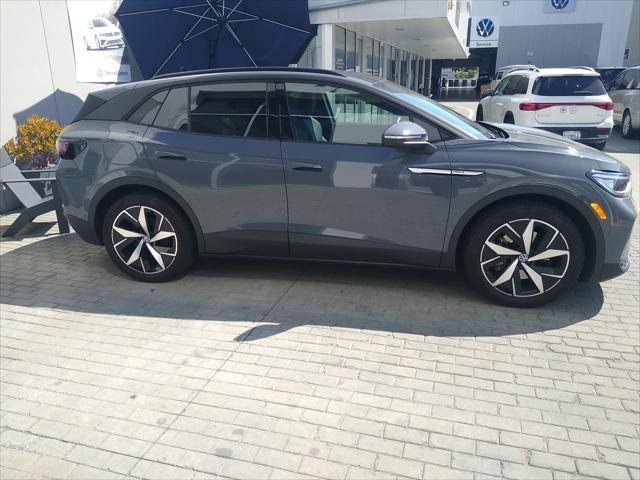 used 2023 Volkswagen ID.4 car, priced at $27,019