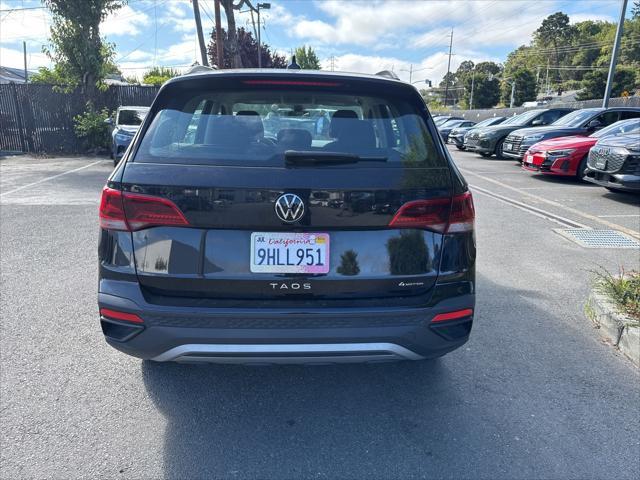 used 2023 Volkswagen Taos car, priced at $23,294