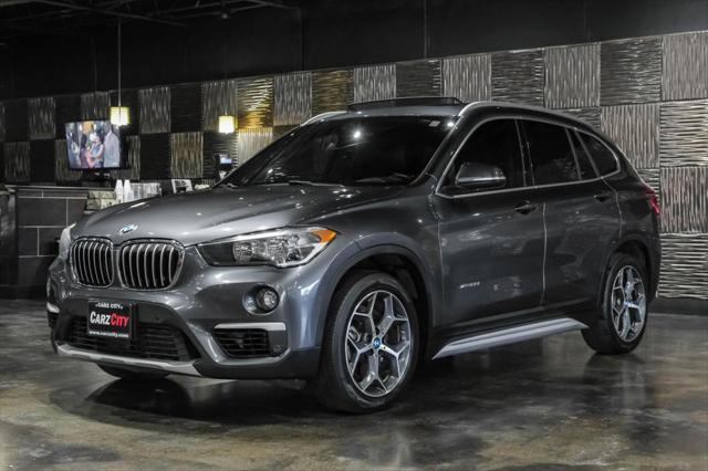 used 2018 BMW X1 car, priced at $15,480