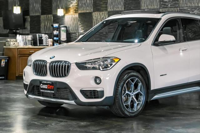 used 2018 BMW X1 car, priced at $17,980