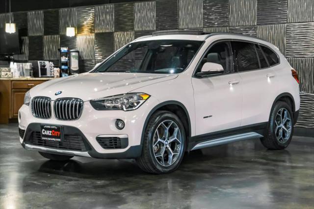 used 2018 BMW X1 car, priced at $17,492