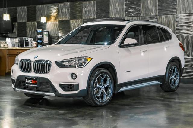 used 2018 BMW X1 car, priced at $17,980