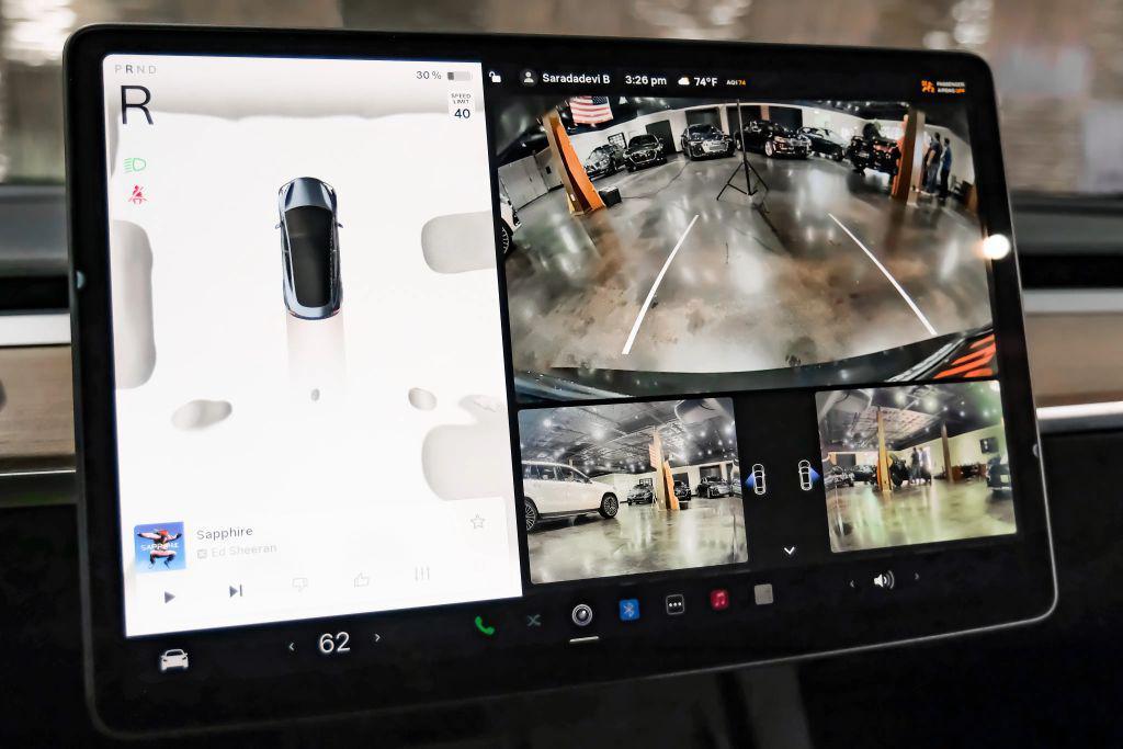 used 2023 Tesla Model 3 car, priced at $27,996