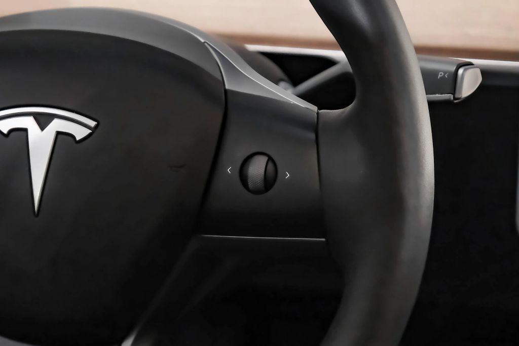 used 2023 Tesla Model 3 car, priced at $27,996