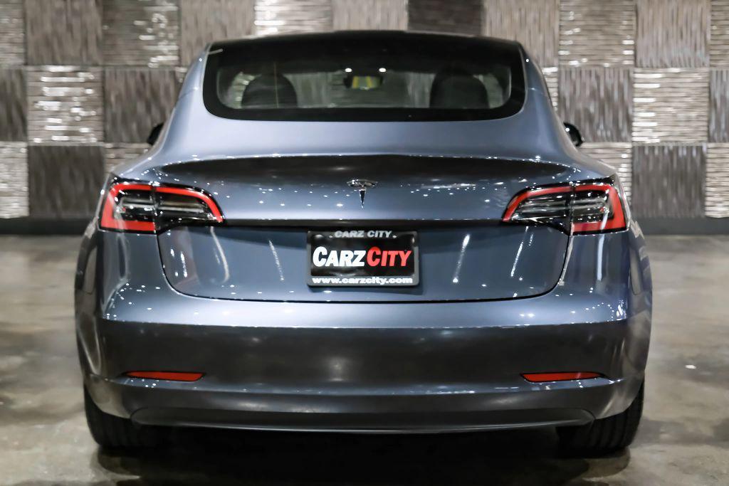 used 2023 Tesla Model 3 car, priced at $27,996