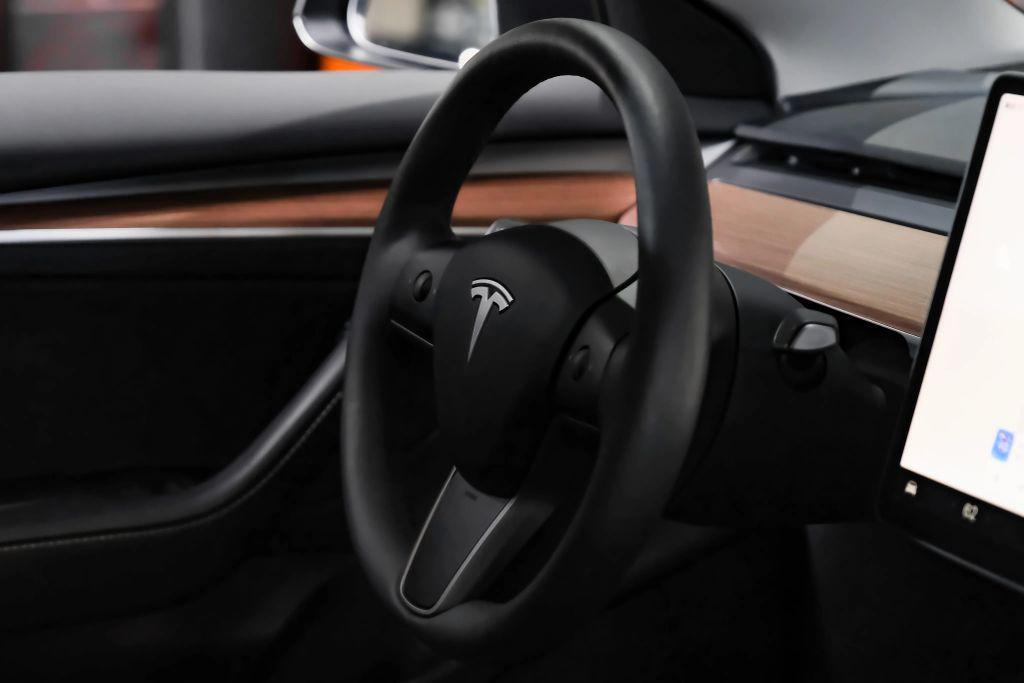used 2023 Tesla Model 3 car, priced at $27,996
