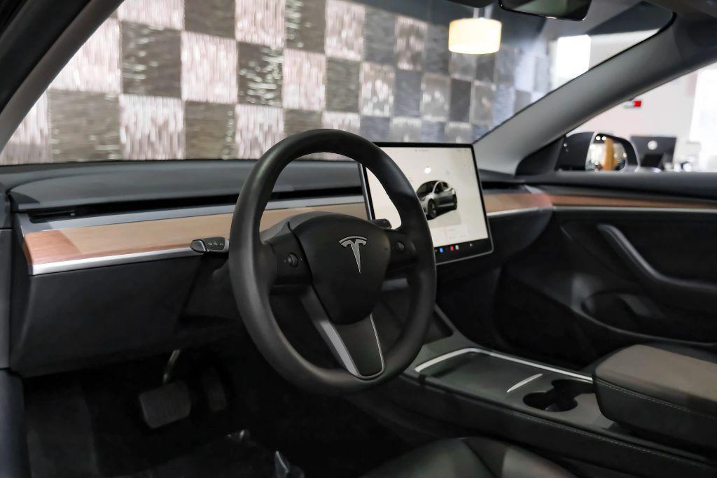 used 2023 Tesla Model 3 car, priced at $27,996