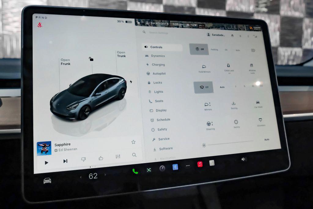 used 2023 Tesla Model 3 car, priced at $27,996