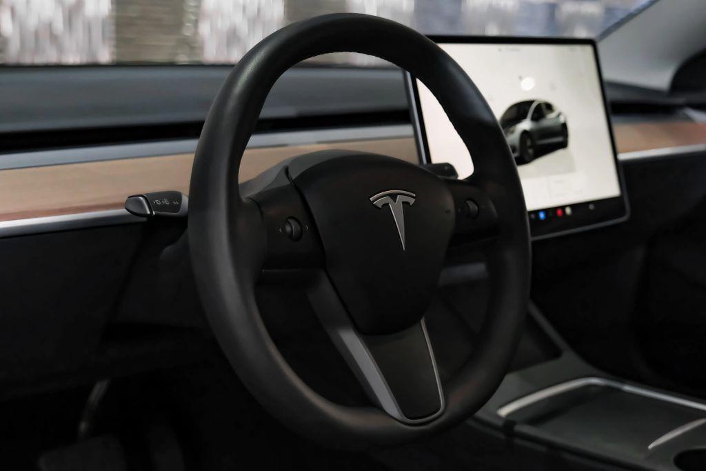 used 2023 Tesla Model 3 car, priced at $27,996