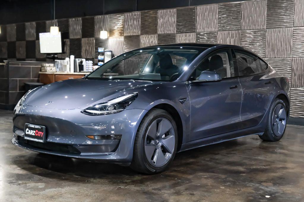 used 2023 Tesla Model 3 car, priced at $27,996