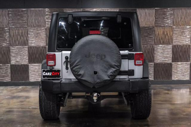 used 2018 Jeep Wrangler JK Unlimited car, priced at $21,485