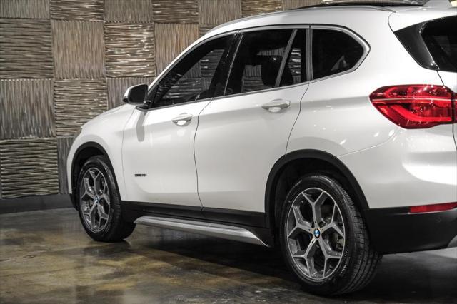 used 2018 BMW X1 car, priced at $17,890