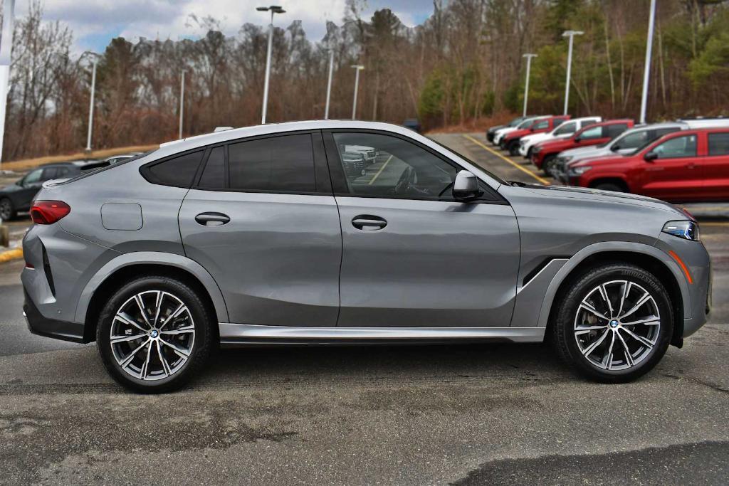 used 2024 BMW X6 car, priced at $64,877