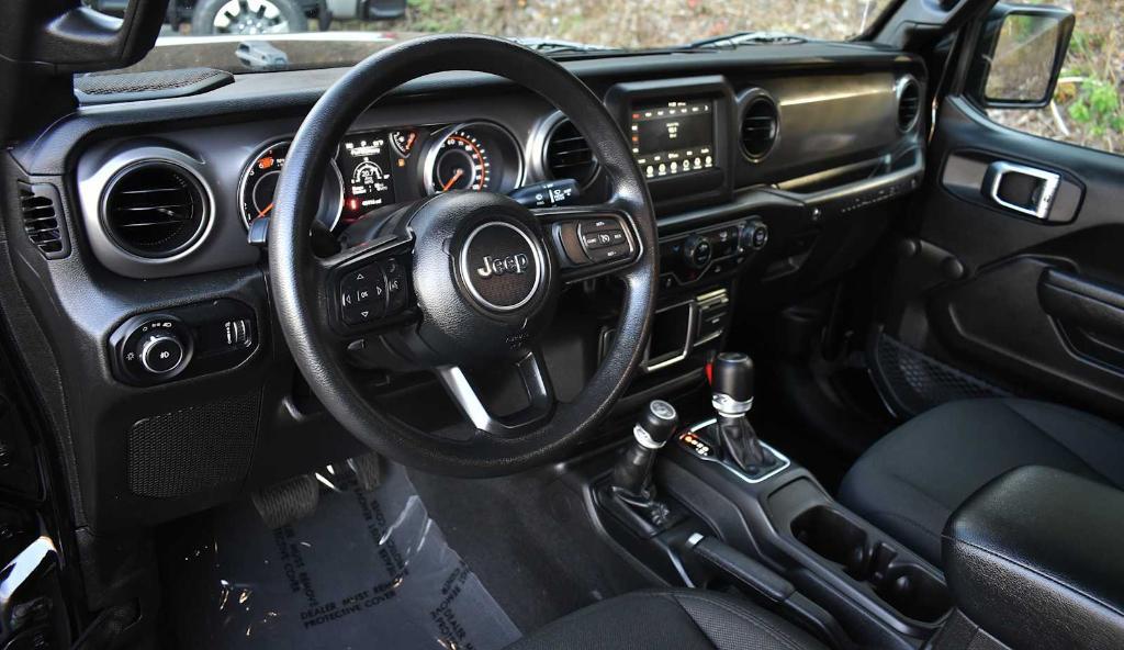 used 2023 Jeep Wrangler car, priced at $26,877