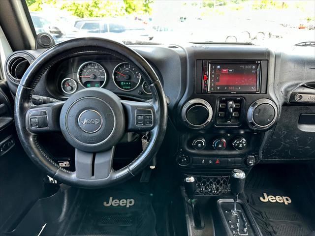 used 2012 Jeep Wrangler Unlimited car, priced at $14,495