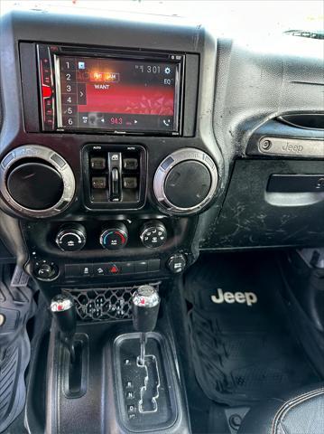 used 2012 Jeep Wrangler Unlimited car, priced at $14,495