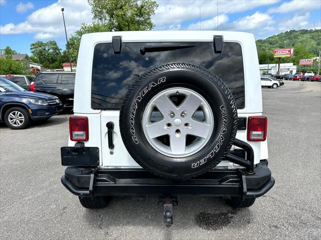 used 2012 Jeep Wrangler Unlimited car, priced at $14,495