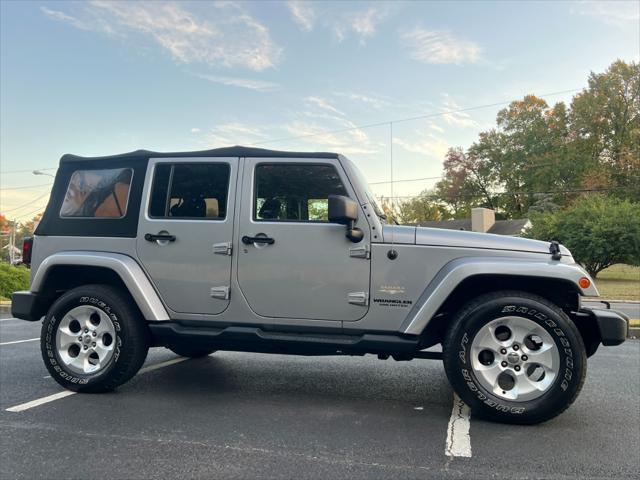 used 2014 Jeep Wrangler Unlimited car, priced at $14,495