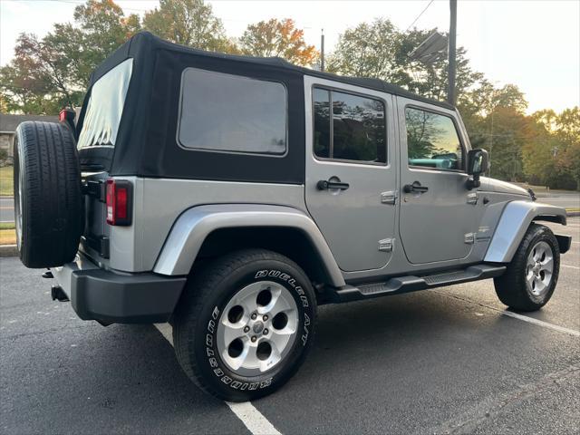 used 2014 Jeep Wrangler Unlimited car, priced at $14,495