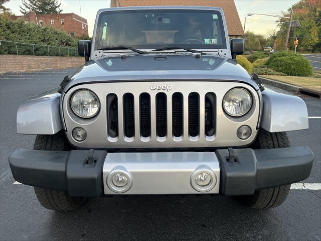 used 2014 Jeep Wrangler Unlimited car, priced at $14,495