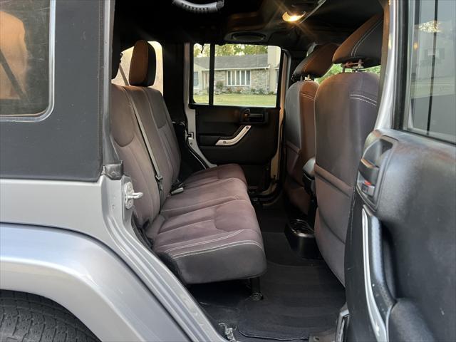 used 2014 Jeep Wrangler Unlimited car, priced at $14,495