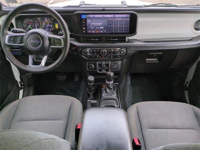 used 2024 Jeep Wrangler 4xe car, priced at $33,080