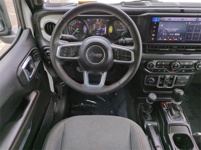 used 2024 Jeep Wrangler 4xe car, priced at $33,080