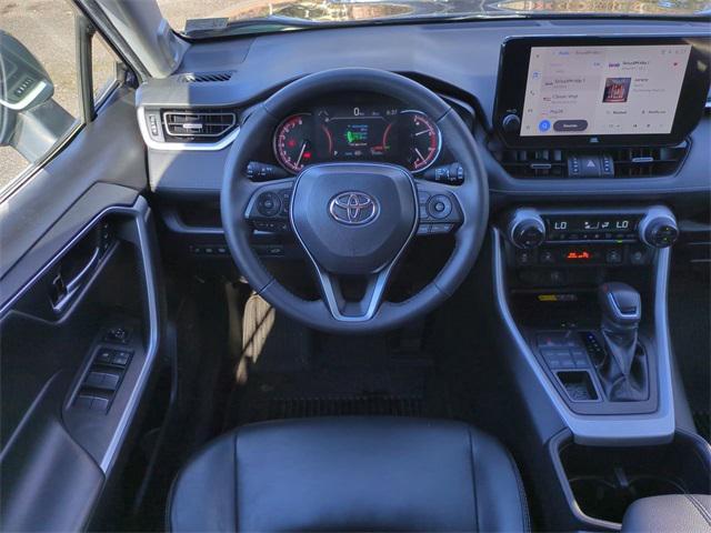 used 2023 Toyota RAV4 car, priced at $34,990