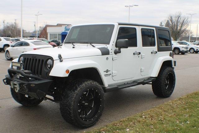 used 2014 Jeep Wrangler Unlimited car, priced at $16,505