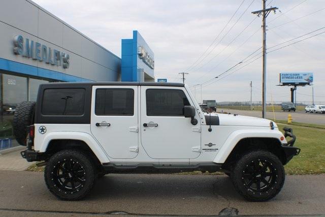 used 2014 Jeep Wrangler Unlimited car, priced at $16,505