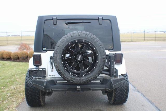 used 2014 Jeep Wrangler Unlimited car, priced at $16,505